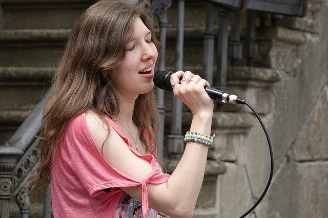 Singer performing passionately